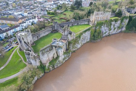 Beautiful aerial panorama view of the Chepstow downtown and Chepstow Castle, Wales, United Kingdom, daytimeの写真素材