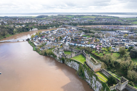 Beautiful aerial panorama view of the Chepstow downtown and Chepstow Castle, Wales, United Kingdom, daytimeの写真素材