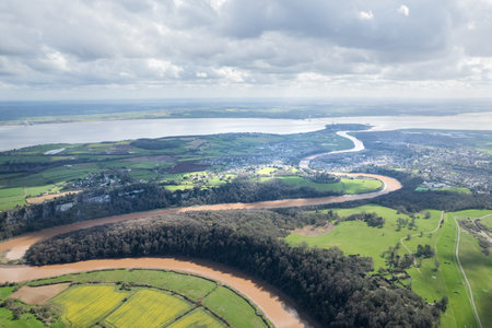 Amazing aerial panorama of Tintern Abbey, River Wye, and the nearby landscape, UKの写真素材