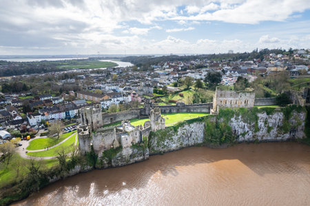 Beautiful aerial panorama view of the Chepstow downtown and Chepstow Castle, Wales, United Kingdom, daytimeの写真素材