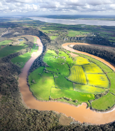 Amazing aerial panorama of Tintern Abbey, River Wye, and the nearby landscape, UKの写真素材