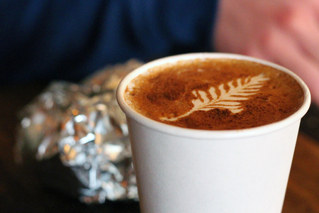 Decorative Foam Pattern on an Autumnal Cup of Coffeeの写真素材