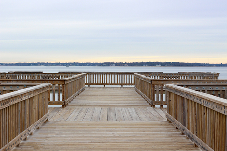 Expansive Wooden Dock on a Lake in Michiganの写真素材