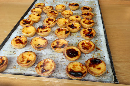 LISBON BAIRRO ALTO, PORTUGAL - AUG 04: Pasteis de nata, also known as Portuguese custard tart, a...