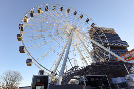 MUNICH BAVARIA GERMANY - DEC 30: New Munich district Werksviertel with construction site, modern offices, residential building, Hi-Sky ferris wheel near city center of Munich, Germany on December 2019のeditorial素材