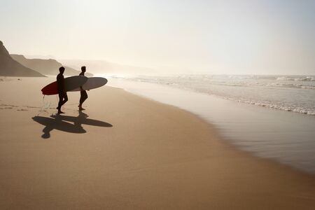 View to Surfer beach Praia do Lagido and island Baleal in summer, Peniche Portugalの写真素材