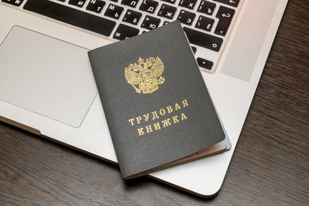 Moscow / Russia - January 21, 2021: Russia employment record book on laptopのeditorial素材