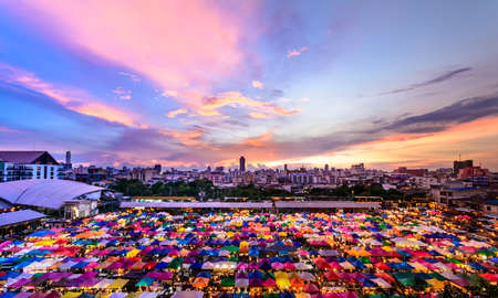 Sunset City view landscape and Colorful Market in thailand for backgroundの写真素材