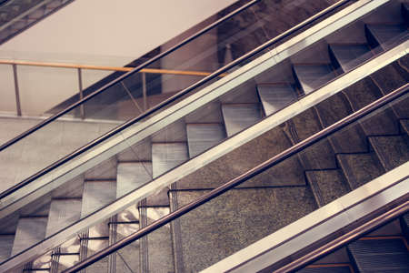 Modern escalator in shopping mall tone vintageの写真素材