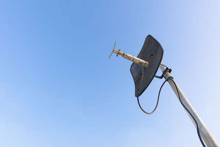 Satellite dish with blue sky.の写真素材