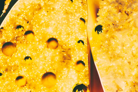 Yellow christmas ornaments on treeの写真素材