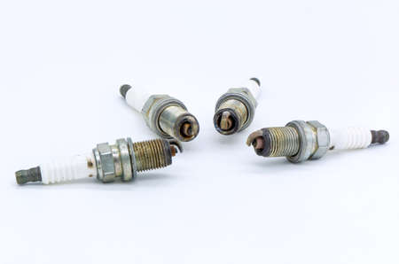Old spark plug isolated on the white backgroundの写真素材