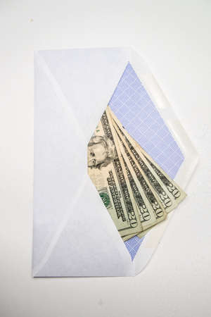 five twenty dollar bills in envelopの写真素材