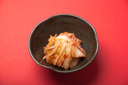 kimchi with red backgroundの写真素材