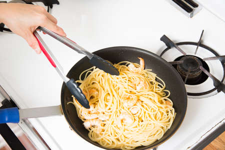 cooking shrimp spaghettiの写真素材