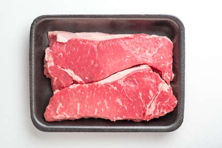 raw new york strip steakの写真素材