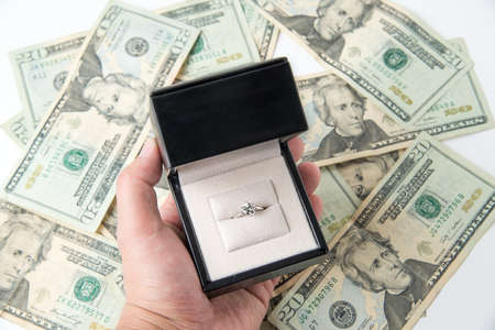 diamond ring on moneyの写真素材