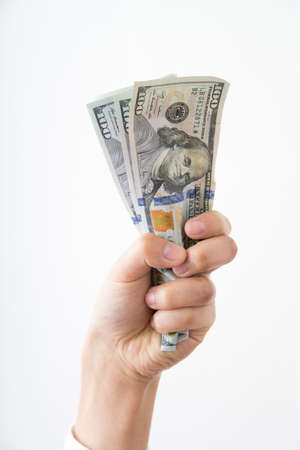 hand grabbing money