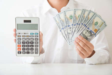 showing money and calculator