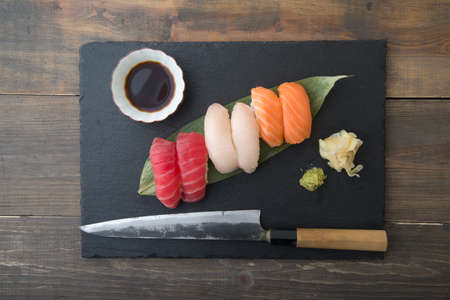 sushi platter with sashimi knifeの写真素材