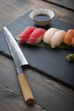 sushi platter with sashimi knifeの写真素材