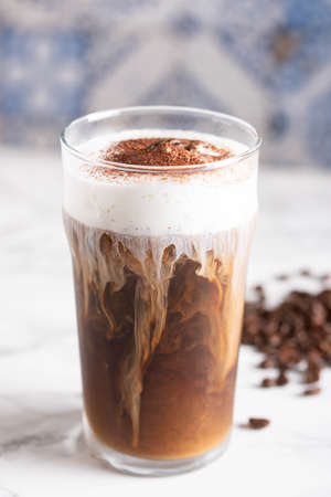 iced cappuccino with coffee beanの写真素材