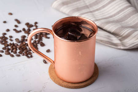 cold brewed coffee in copper mugの写真素材