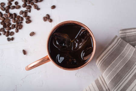 cold brewed coffee in copper mugの写真素材