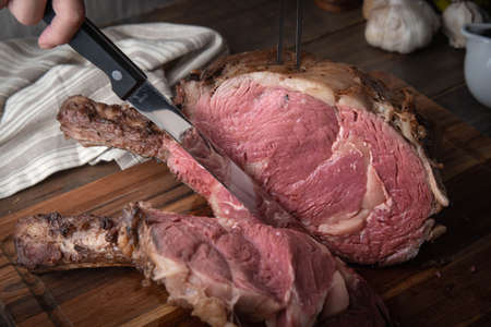 roasted thick cut ribeye with boneの写真素材