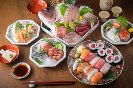 combination of japanese sushi and sashimi platterの写真素材