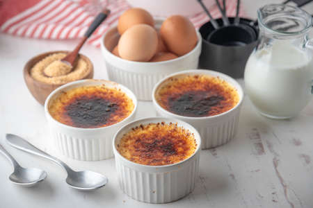 creme brulee and ingredients, milk, egg and sugar
