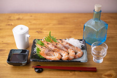 red shrimp sashimi with japanese sakeの写真素材