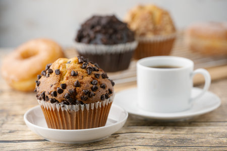 chocolate chip muffin with donut and coffeeの写真素材