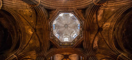 Inside a Gothic cathedral in Barcelona, Spain.