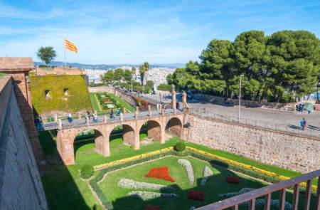 Barcelona, Spain, Nov 3rd, 2013:   People visit old fort Montju Castle in Barcelona.  16th century military fortress in is now municipal facility atop of Montju hill near Balearic Sea in Spain.のeditorial素材