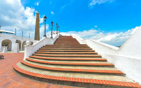Ceramic tile steps and white walls lead to a second level in the older section of Panama   city. ...