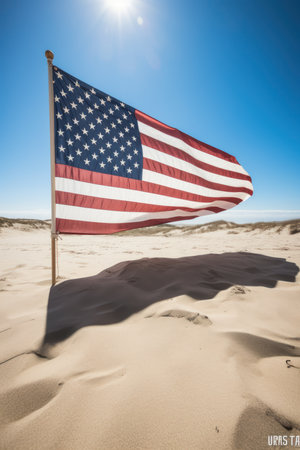 American flag on the sand dunes in the United States of Americaの素材