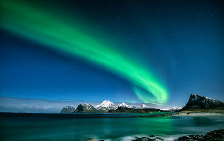 Aurora borealis in the night sky over Lofoten islands, Norwayの写真素材