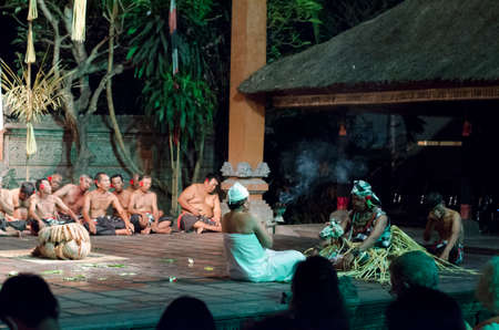 Kecak and Barong Fire Dance. Two guys prepare for fire dance show near Batubulan, Sukawati, Gianyar, Bali, Indonesiaのeditorial素材