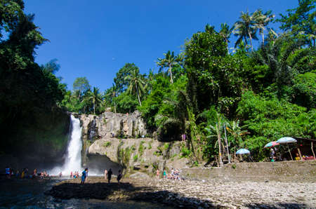 Tegenungan waterfall with blue skies above Kemenuh Village, Sukawati, Gianyar, Bali, Indonesiaのeditorial素材