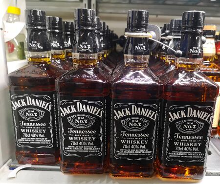 Jack Daniels whiskey from the United States in a glass bottle was put up for sale in the Metro AG hypermarket on January 20, 2020 in Russia, Kazan, Tikhoretskaya Street 4.のeditorial素材