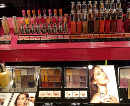 Shadow stick for eyelids and lipstick from Dior company in perfume and cosmetics store on February 10, 2020 in Russia, Tatarstan, Kazan, Pushkin Street 2.のeditorial素材