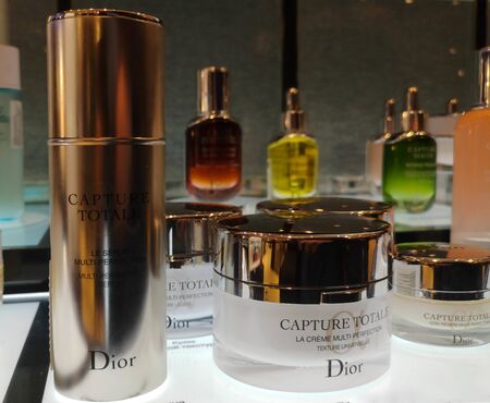 Facial and neck color anti-aging cream and serum lotion Capture Totale Multi-Perfect Creme in cosmetics store on February 10, 2020 in Russia, Tatarstan, Kazan, Pushkin Street 2.のeditorial素材