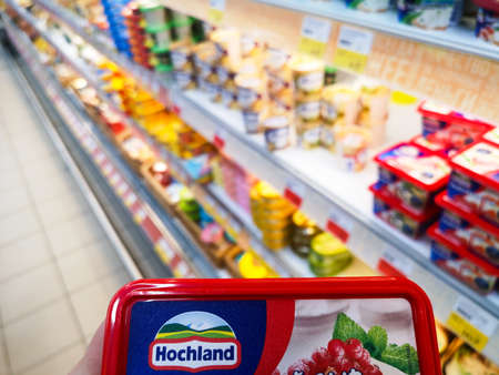 German melted hohland cheese near the counter of cheese products in Ashan shopping center on May 6,...