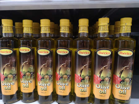Natural olive oil Iberica Extra Virgin in glass bottles is sold in a retail grocery store on May 5, 2020 in Russia, Tatarstan, Kazan, Richard Street Zorge11Bのeditorial素材