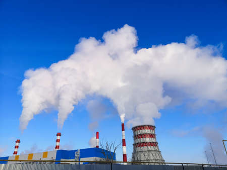 harmful health smoke from the pipes of a thermal power plant in the city
