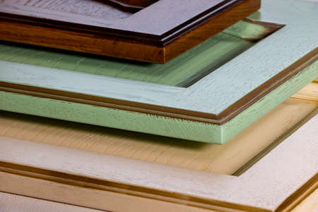 italian kitchen facades of the shabby chic style from solid wood in different colors lie on the...