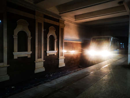 arrival of the metro train at the metro station.