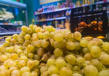 white grapes close-up on sale in a grocery supermarket.の写真素材