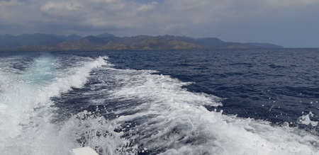 A wave to Gili Trawangan, is a stunning island located in the north of the island of lombok, Indonesiaの写真素材